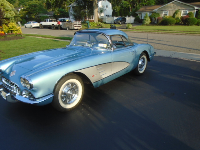 1958 light blue/silver Chevy Corvette Convertible